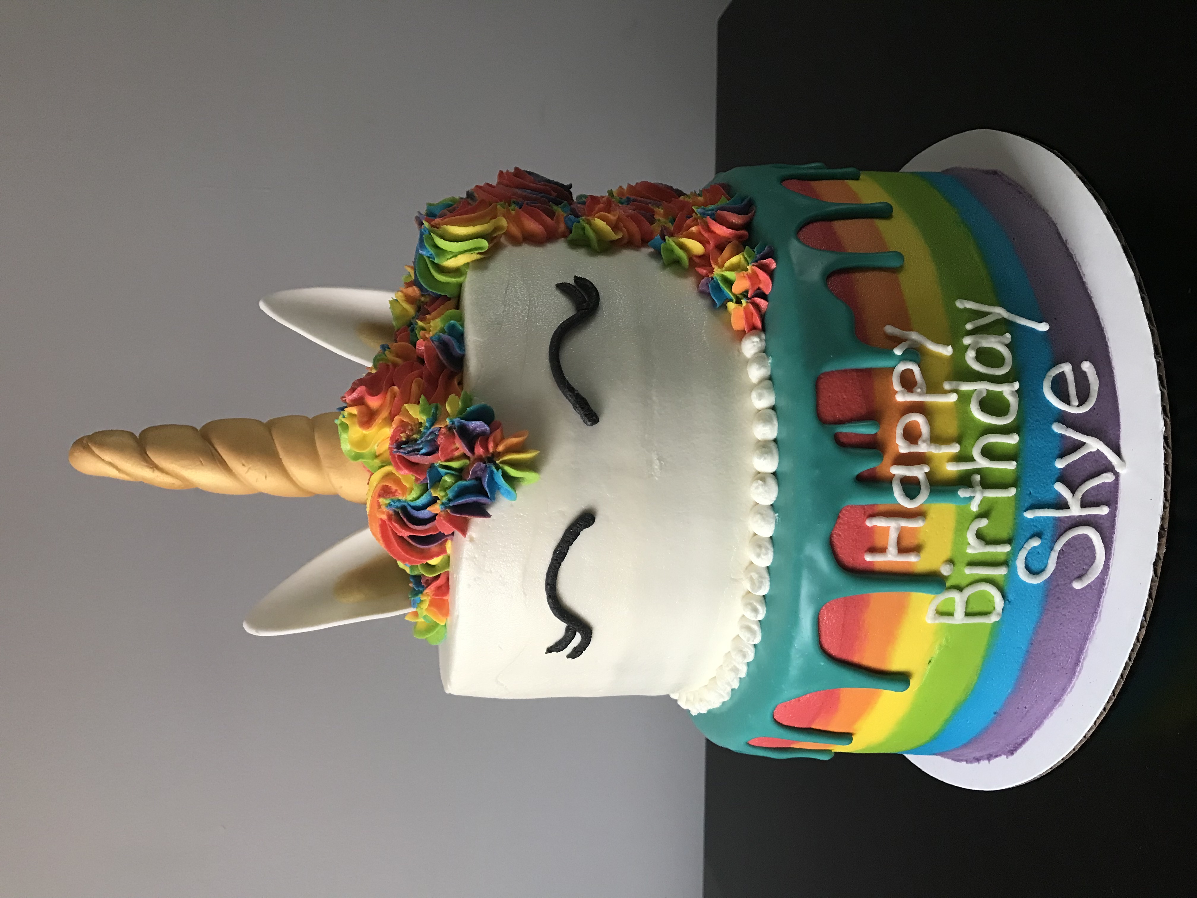 Assortment of specialty gourmet cookies and decorated cake